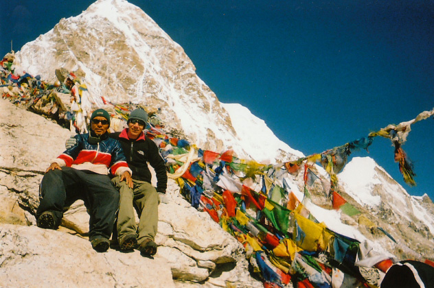 Me and a sherpa guide on top of Kala Pattar