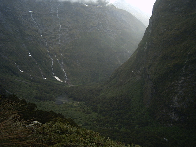 milford track pass view Clinton Valley from Mackinnon Pass on the Milford Track, New Zealand