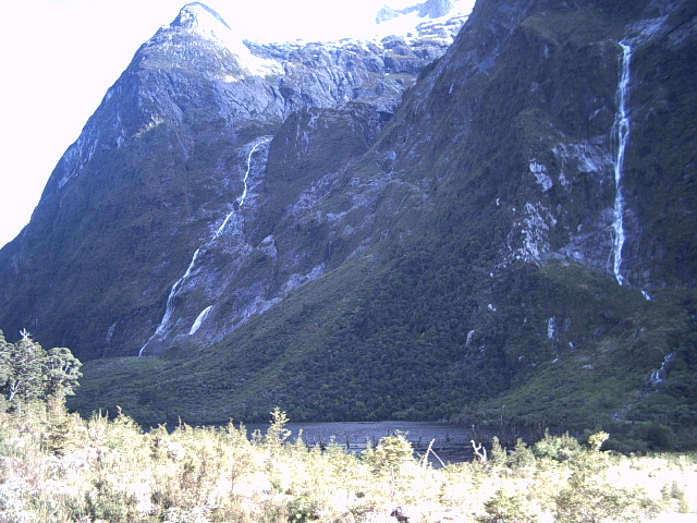 milford track waterfalls Waterfalls and cliffs on the Milford Track, New Zealand