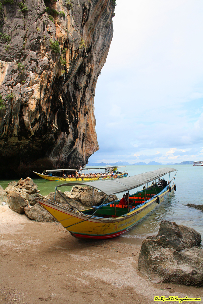 long tailed boat james bond island A long tail boat on the beach of James Bond Island in Phang Nga Bay, Thailand