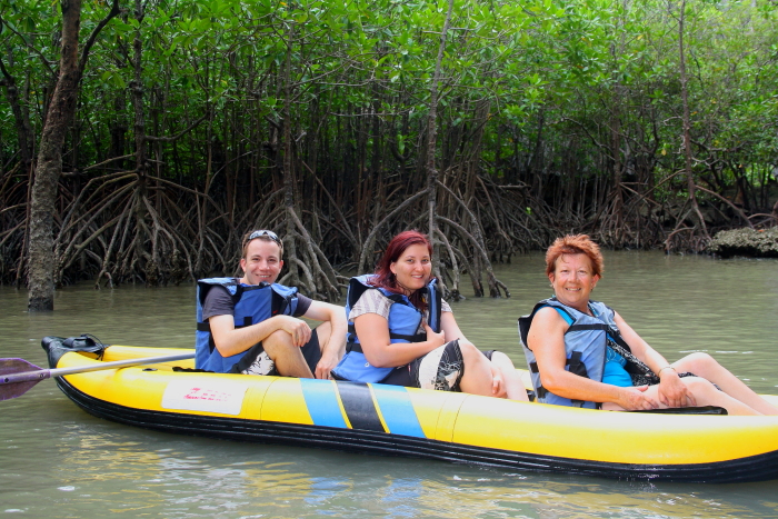 sea canoeing us on canoe Sea canoeing in Phang Nga Bay, Thailand