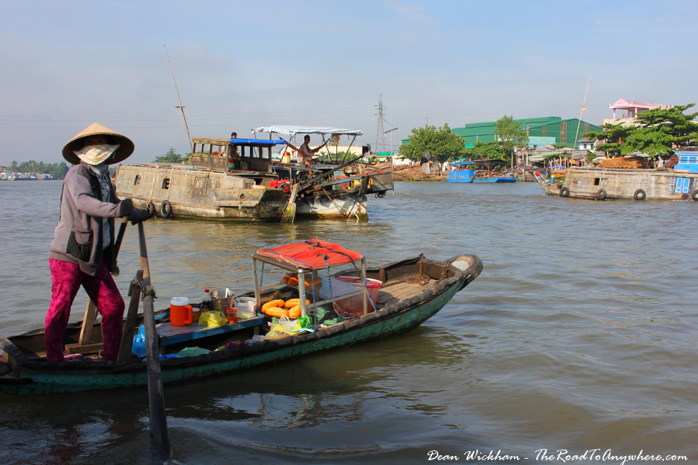 Woman Selling Baguettes From Her Boat in Cai Rang Floating Market ...